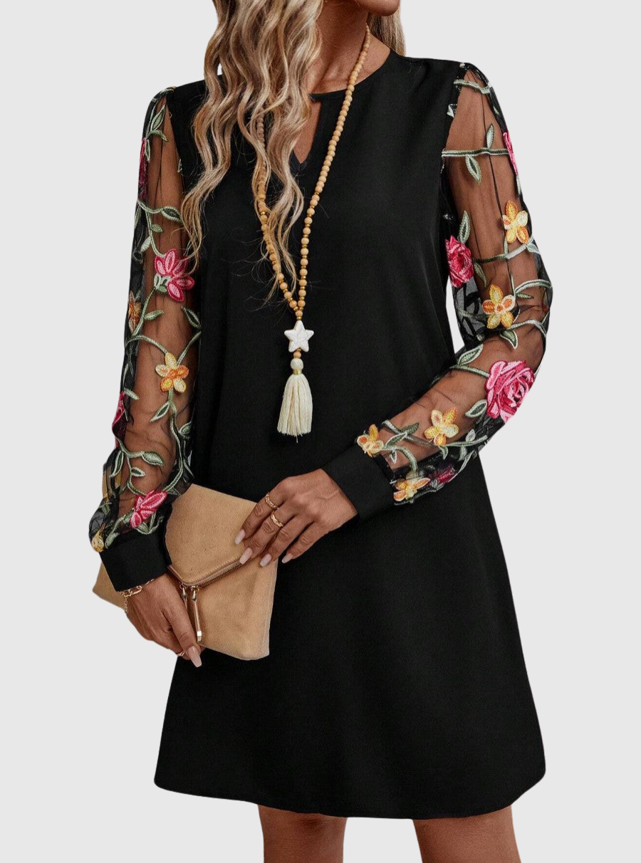 Jolanta | Elegancka sukienka z dekoltem w kształcie V i wyrazistymi rękawami